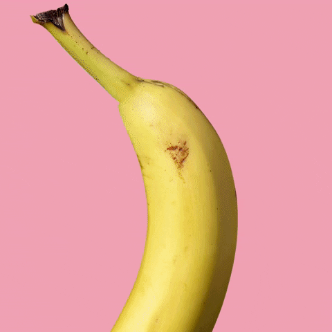 Gif of peeling banana, adorned in chocolate, by Atlanta food photographer Luis Erazo. 