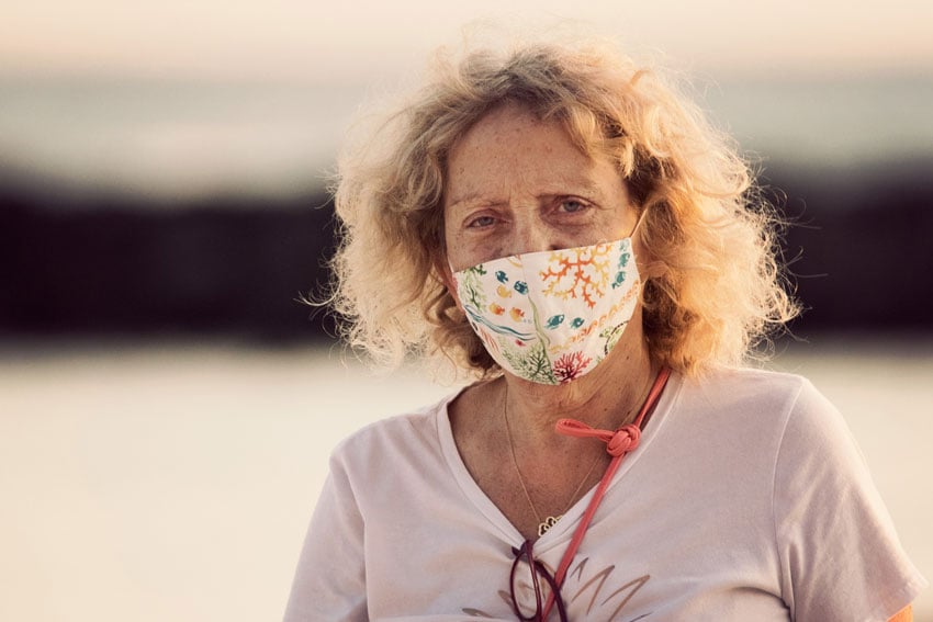 Marco Garcia's portrait of another older woman wearing a mask in Hawaii
