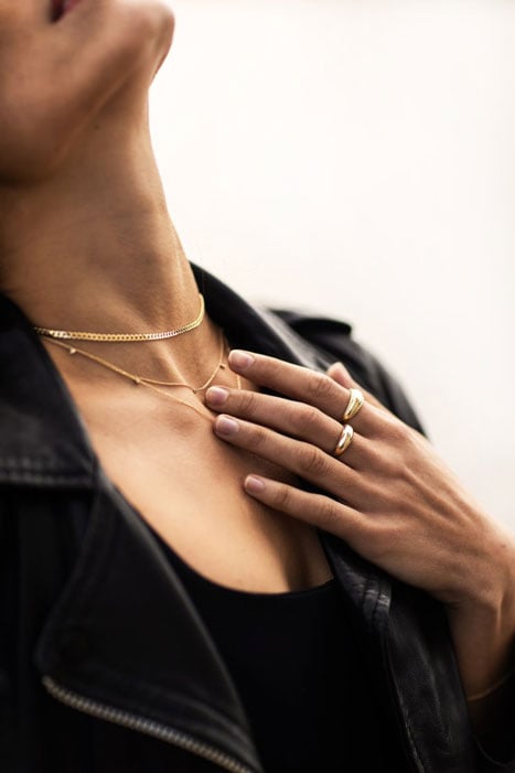 Photo of jewelry on a woman taken by Boston-based product photographer Mark James Dunn. 