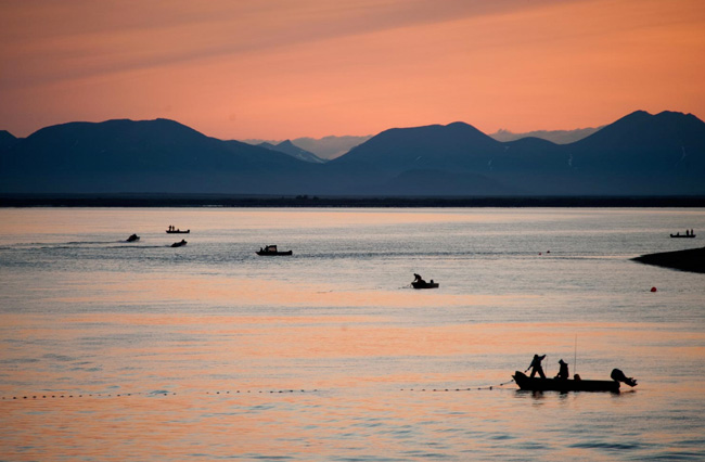 Photo of fishermen on a lake by Seattle-based landscape photographer Nick Hall. 