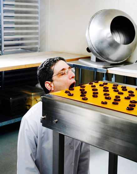 funny photo of a chef about to eat sweets taken by Seattle-based portrait photographer Richard Darbonne. 
