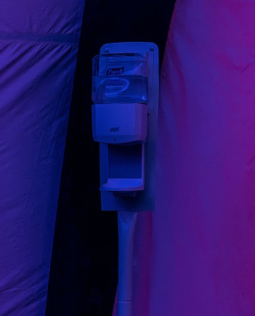 Ronnie Orlando captures a Purell hand sanitizer dispenser bathed in purple light