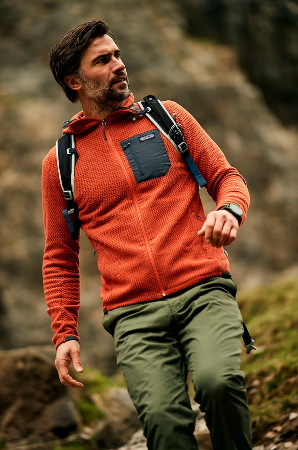 Portrait of a hiker in red-orange cardigan by Telford, United Kingdom-based photographer Ross Woodhall.