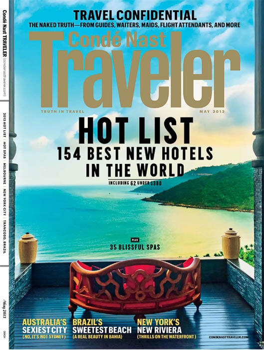 Cover photo for Conde Naste Traveler May 2013 of a hotel balcony looking out into the ocean taken by Vietnam-based travel photographer Justin Mott.