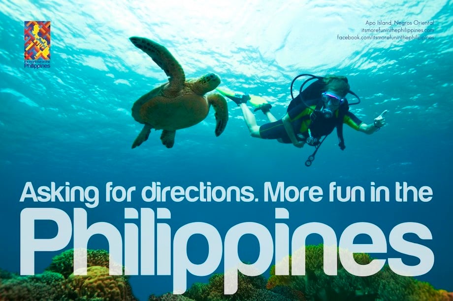 A scuba diver and a turtle enjoying a swim in an advertisement for "It's more fun in the Philippines"