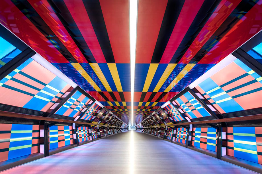 Interior shot by Sean Pollock of a colorful tunnel.