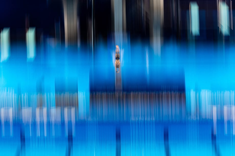 Photo of a man in the Men's 10m dive at the 2020 Tokyo Summer Olympics taken by Washington DC-based fitness photographer Simon Bruty. 