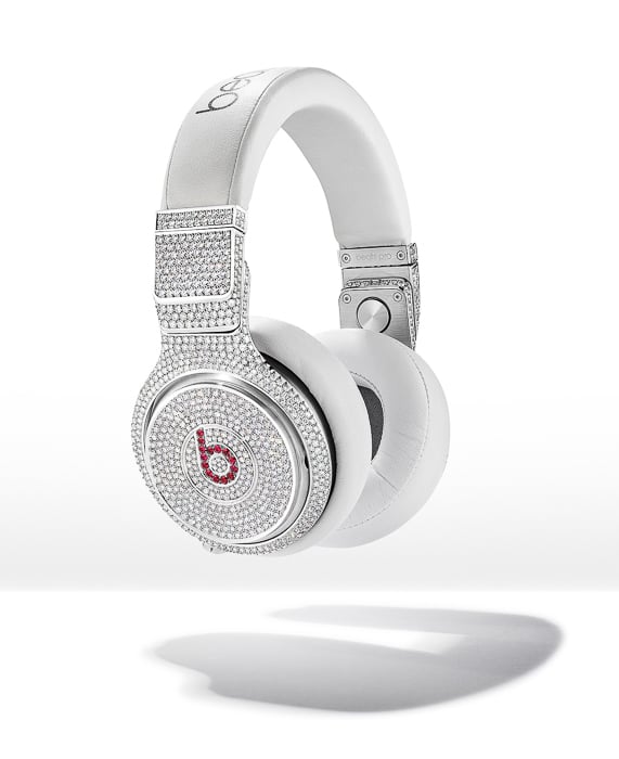 Conceptual photo of white Beats by Dr Dre headphones with jewelry taken by New York-based product photographer Steven DeVilbiss. 