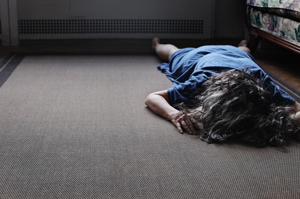 photo by Helena Wolfenson of a woman lying on the ground