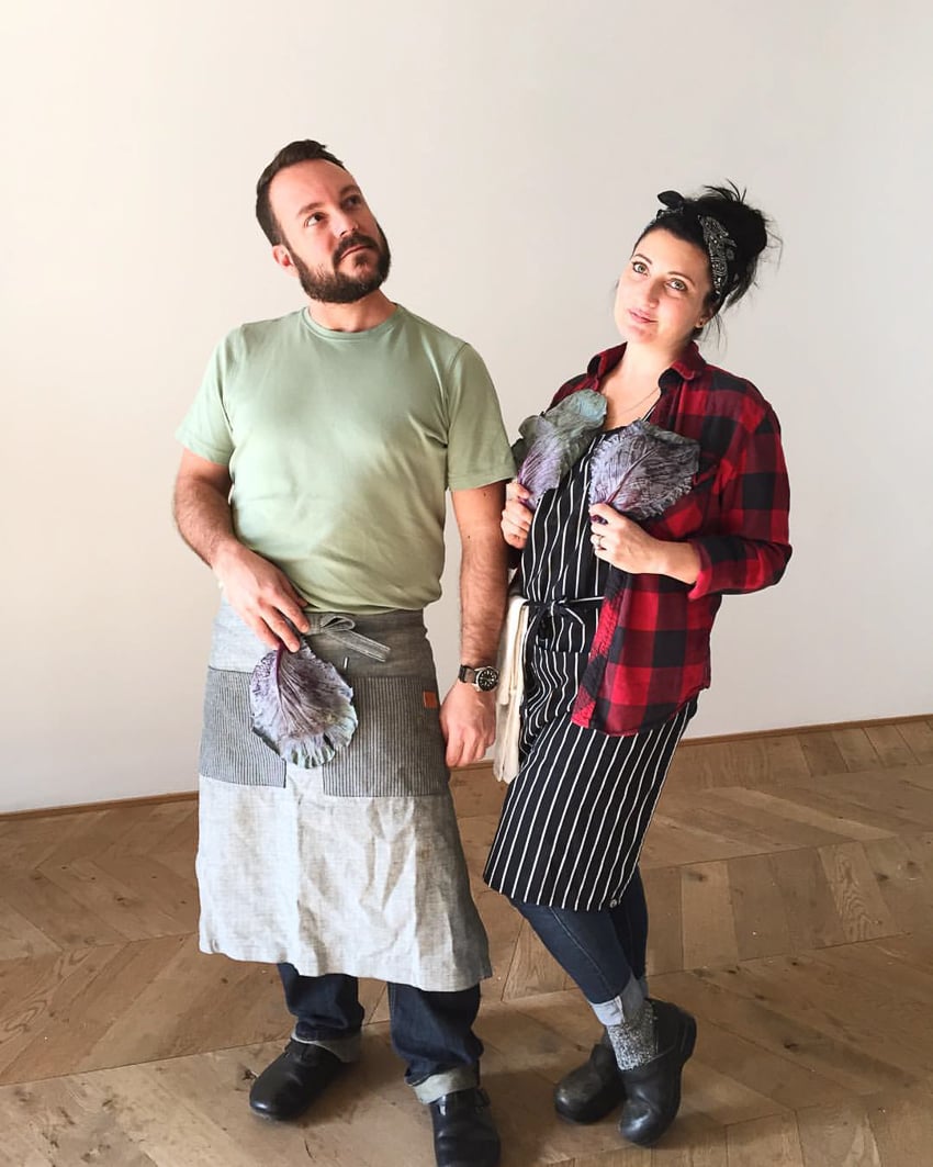 Food stylist Barrett Washburne working on set with his assistant
