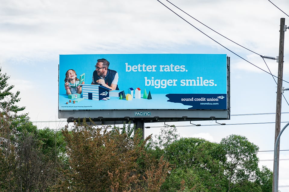 Boone and Stanton's earlier photo of dad and child as shown in an Ad on a Seattle billboard
