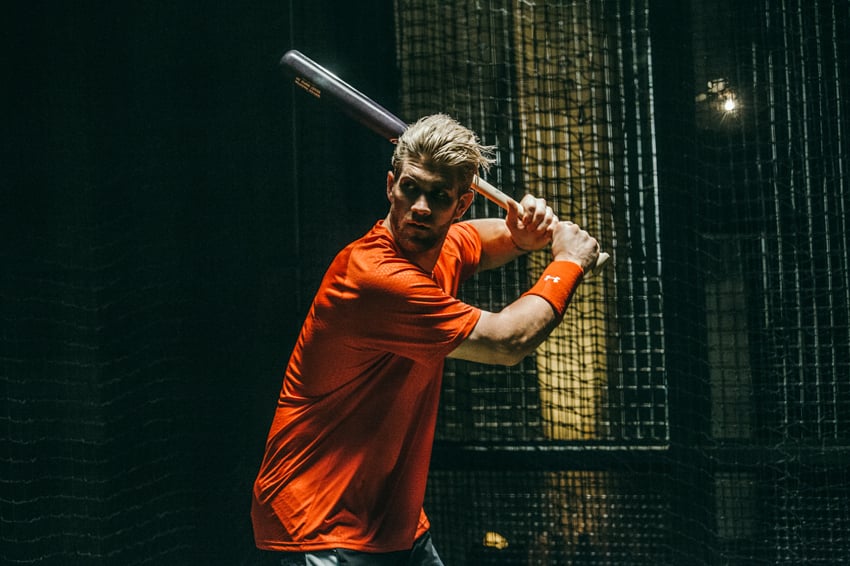 G L Askew II's portrait of Bryce Harper for Gatorade. Harper is posed with a baseball bat as if at bat.