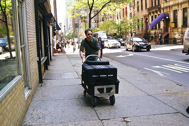 Image of Wonderful Machine pushing portfolios through New York City.
