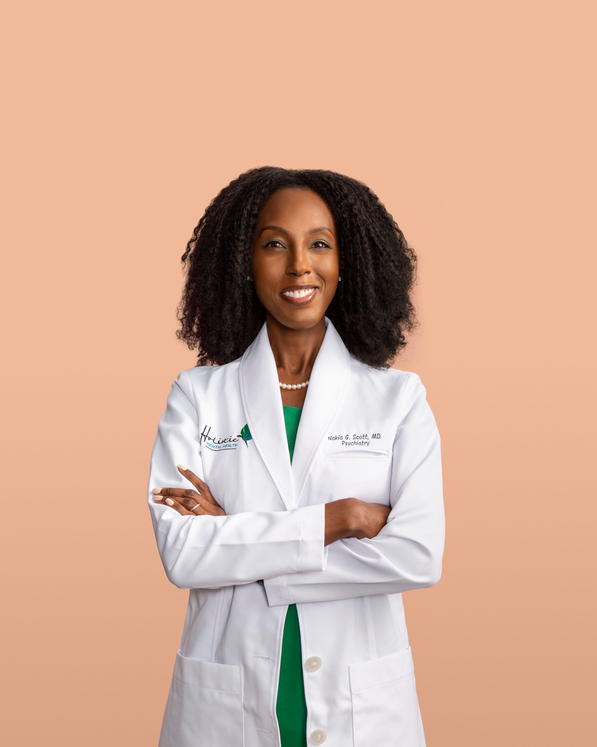 Bill Sallans' photo of Dr. Nakia G. Scott, M.D. with a desaturated peach background
