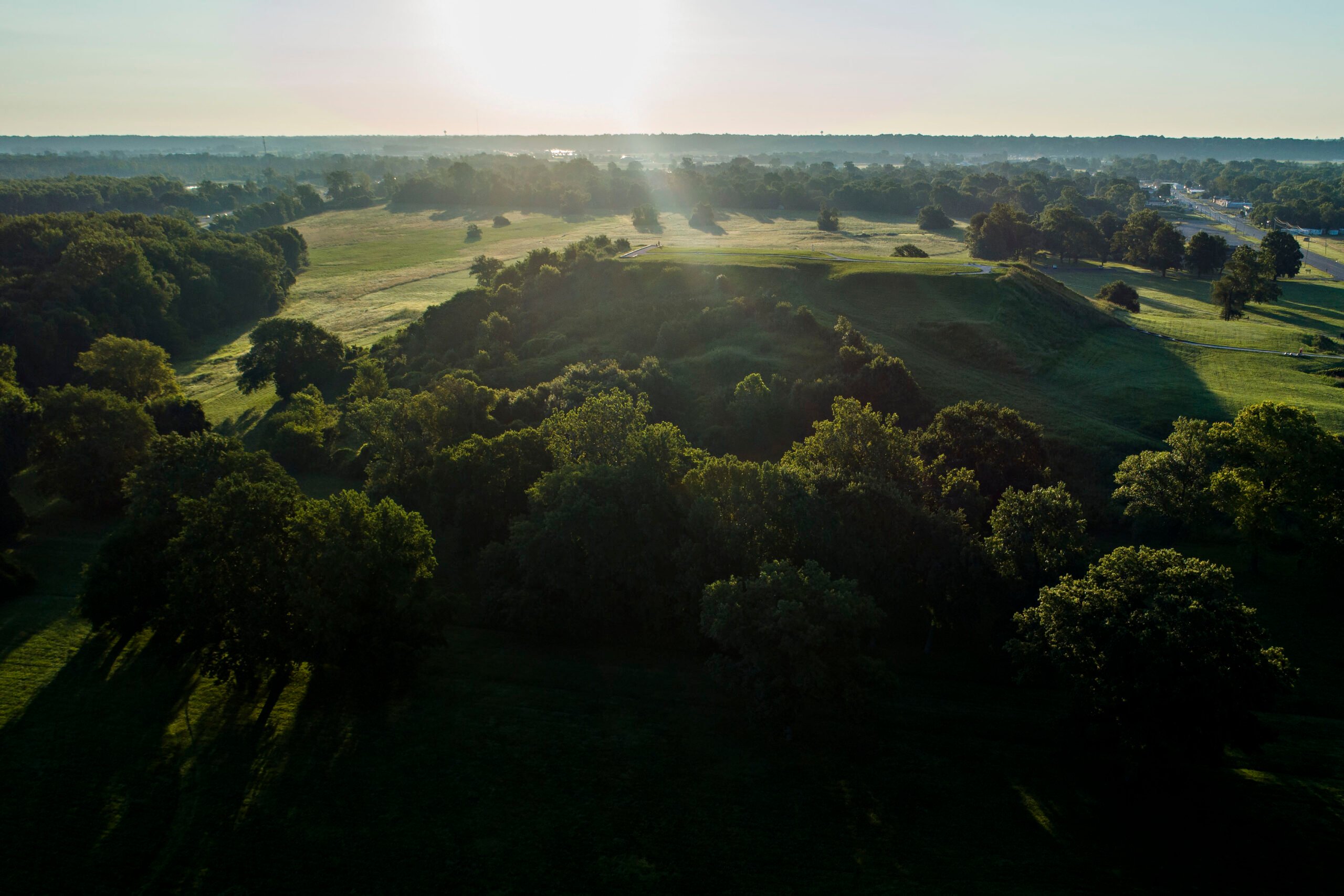 This aerial shot by Daniel Acker is captured as the sun is beginning to set, casting both a glow and shadows