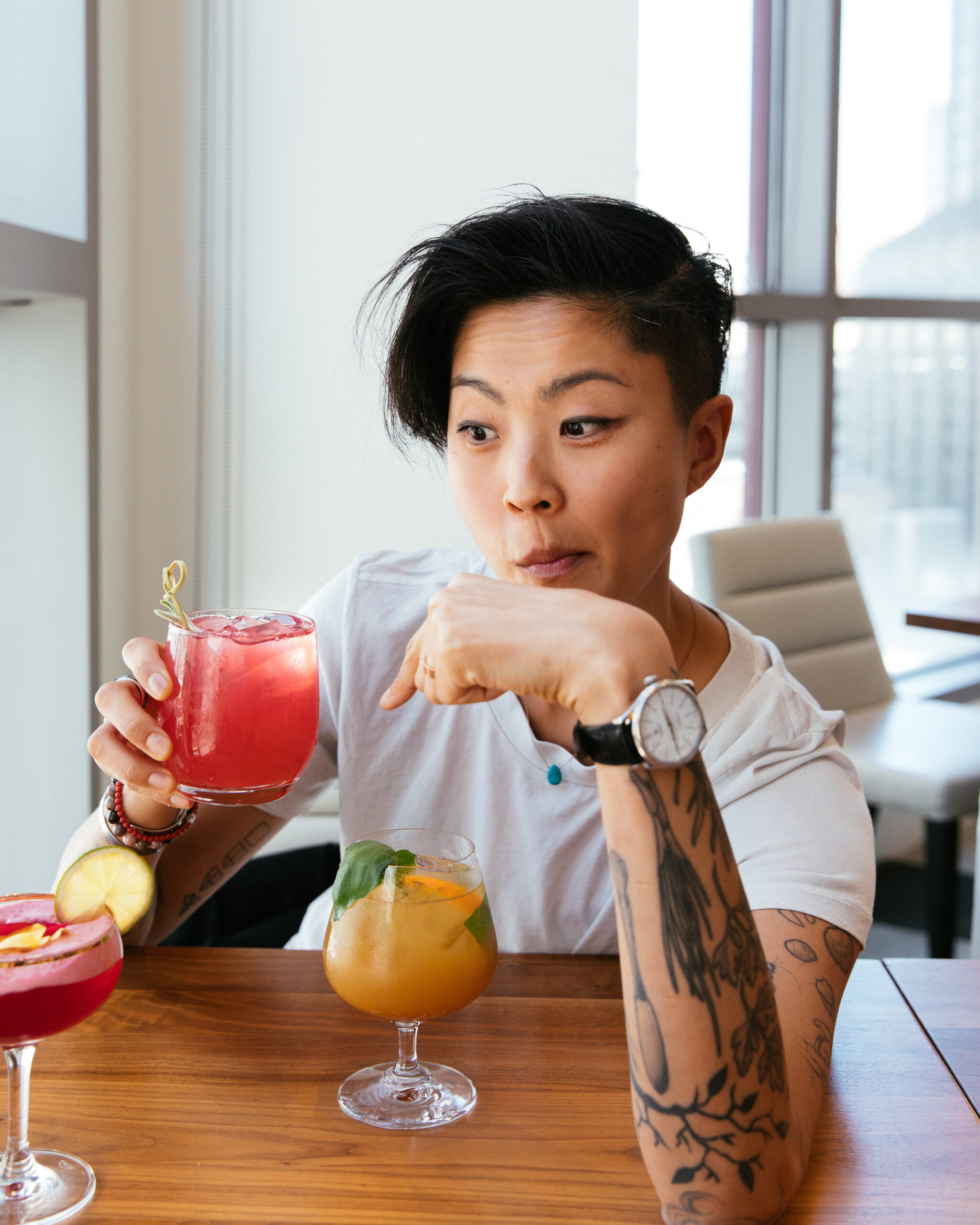Top Chef winner Kristin Kish is captured eyeing up a refreshing cocktail in this photo by Sandy Noto for McCormick