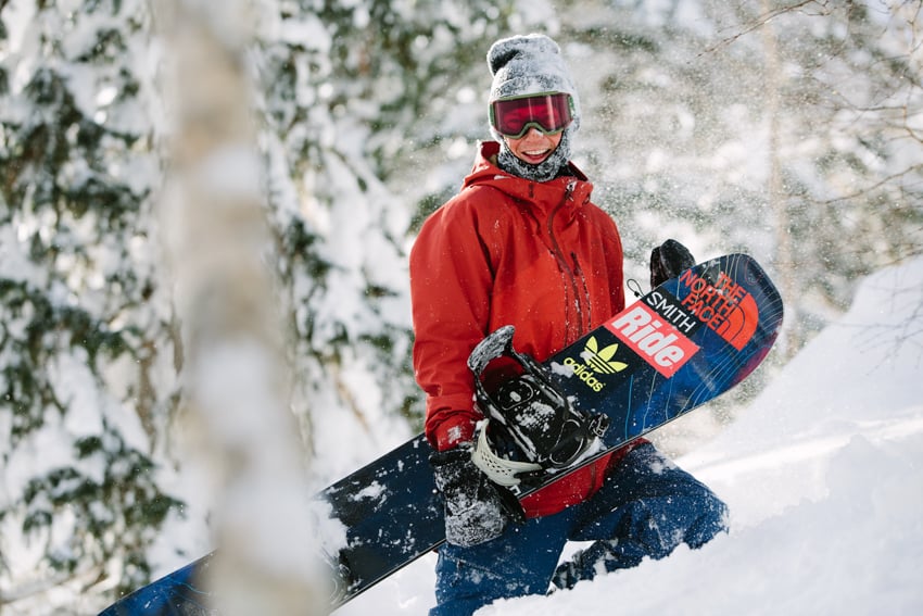 A portrait of a snowboarder in their full equipment shot by Adam Moran.