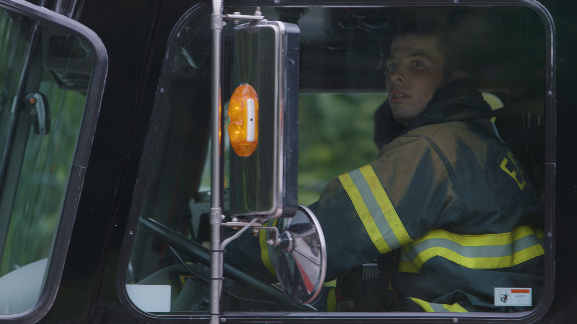Josh LeClair captures a young firefighter driving the truck