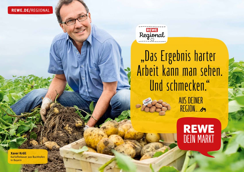 Markus Altmann's photo for a Rewe ad campaign featuring a smiling man in glasses and a blue collared shirt digging up potatoes. In the foreground, there is a bushel of potatoes.