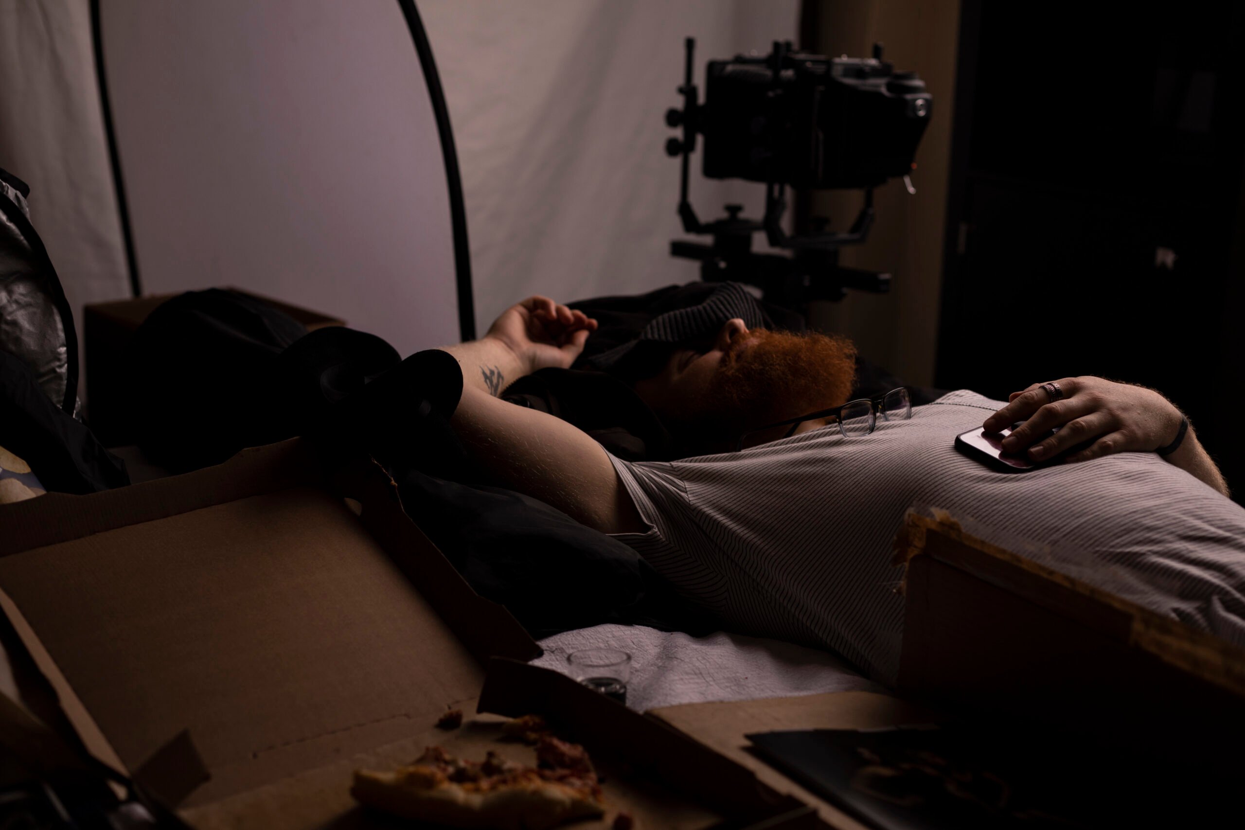 Behind the scenes shot of Eli as he takes a quick nap in between shoots