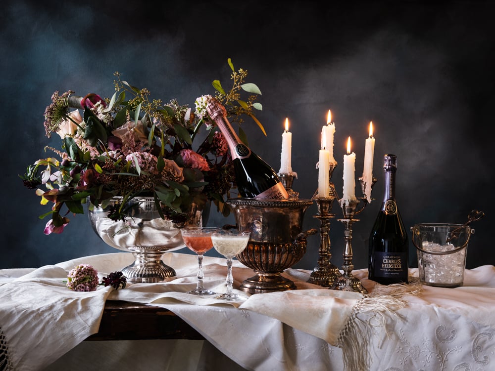 Renaissance-inspired tablescape promoting Valentine's Day offerings. 