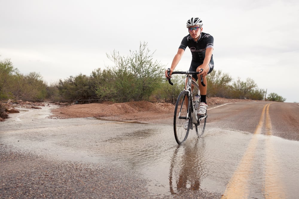 Arizona-based commercial editorial photographer Chris Hinkle shot cyclists in the midst of downpours over mountainous terrain for Bicycling Magazine.