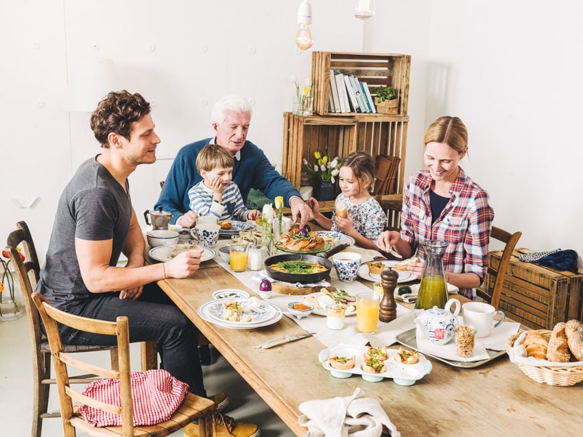 A family having breakfast, photo by Stefan Fuertbauer.
