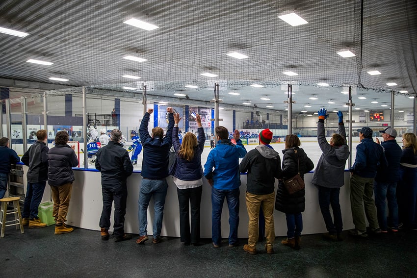 Photographer David Ellis' image of spectators watching a hockey game.