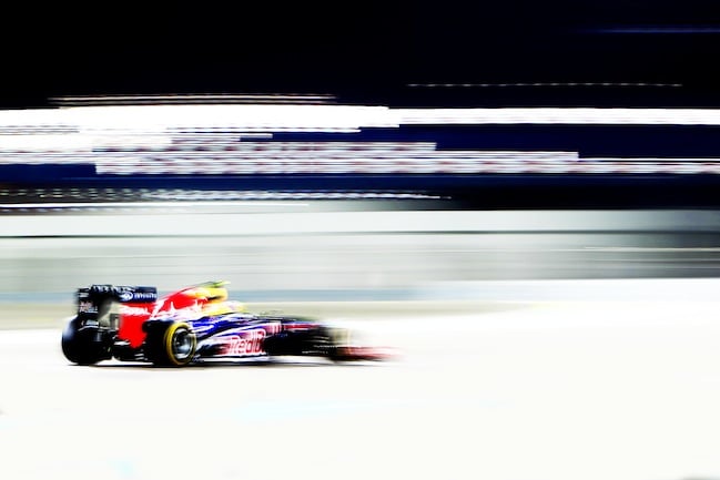 A race car driver practicing at night at the Formula One World Championship in Abu Dhabi on Friday 2 November 2012 shot by UK-based automotive photographer Dom Romney