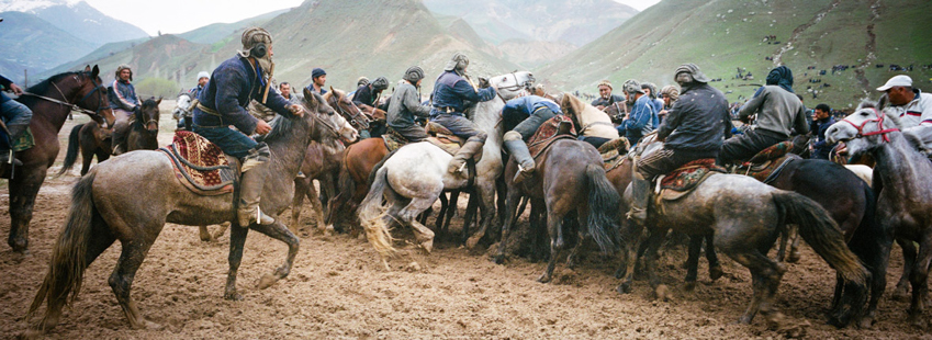 Buzkashi riders on horseback by Marc Ressang in Uzbekistan