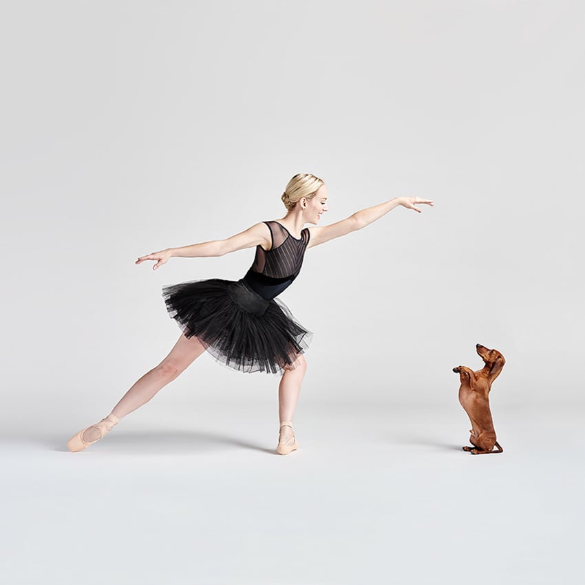 Dancer and dog posing by Pratt Kreidich