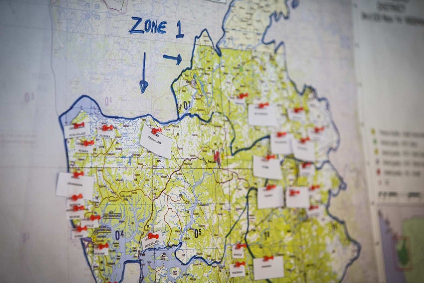 A photo of a map showing the zones of infection and areas deemed safe. Photo by Christopher Beauchamp.