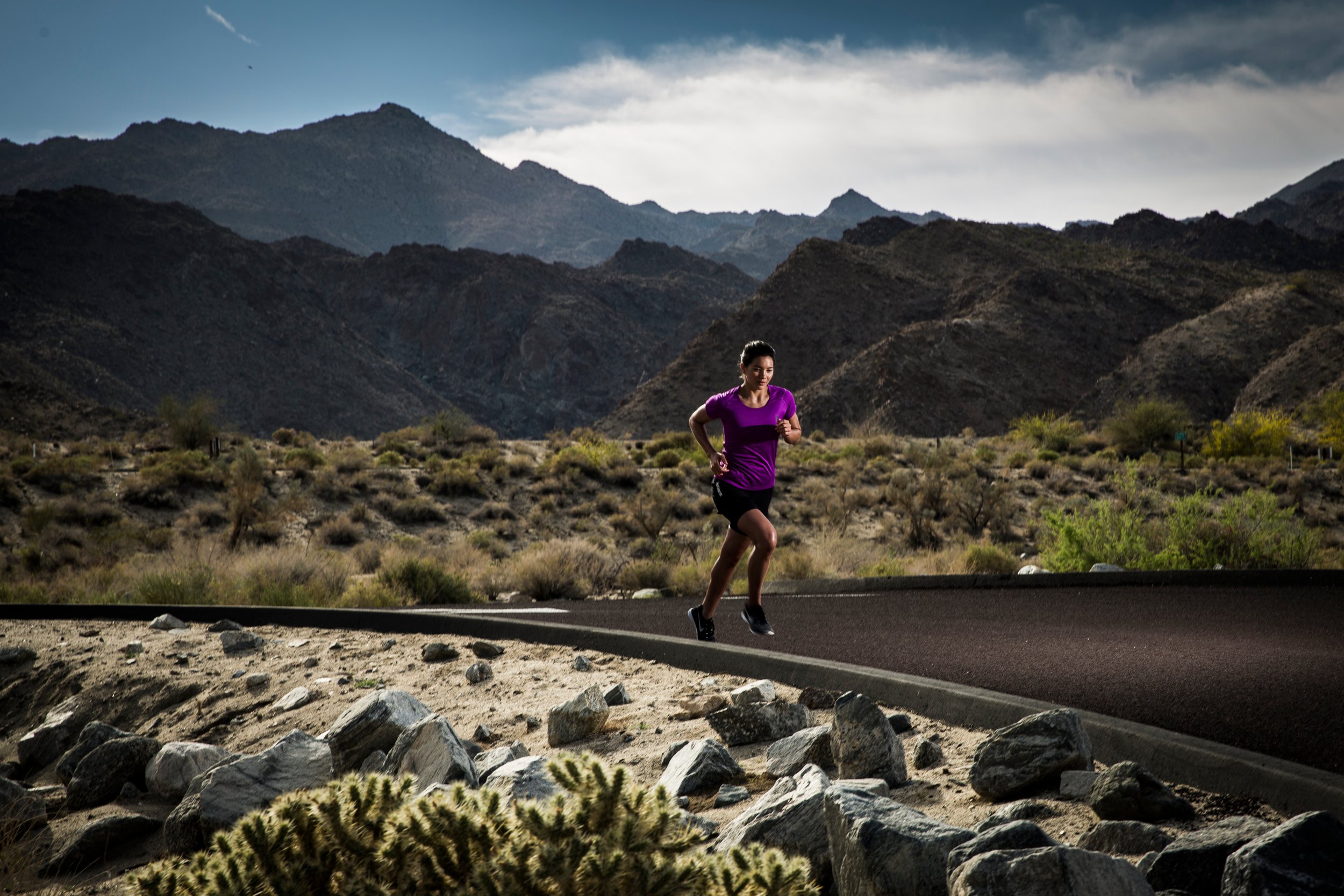 sports/fitness photography showing a woman running, by kristyna archer