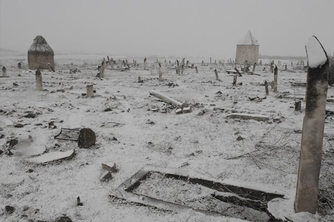 Snowy graveyard shot by Madison, Wis.-based portrait photographer Narayan Mahon