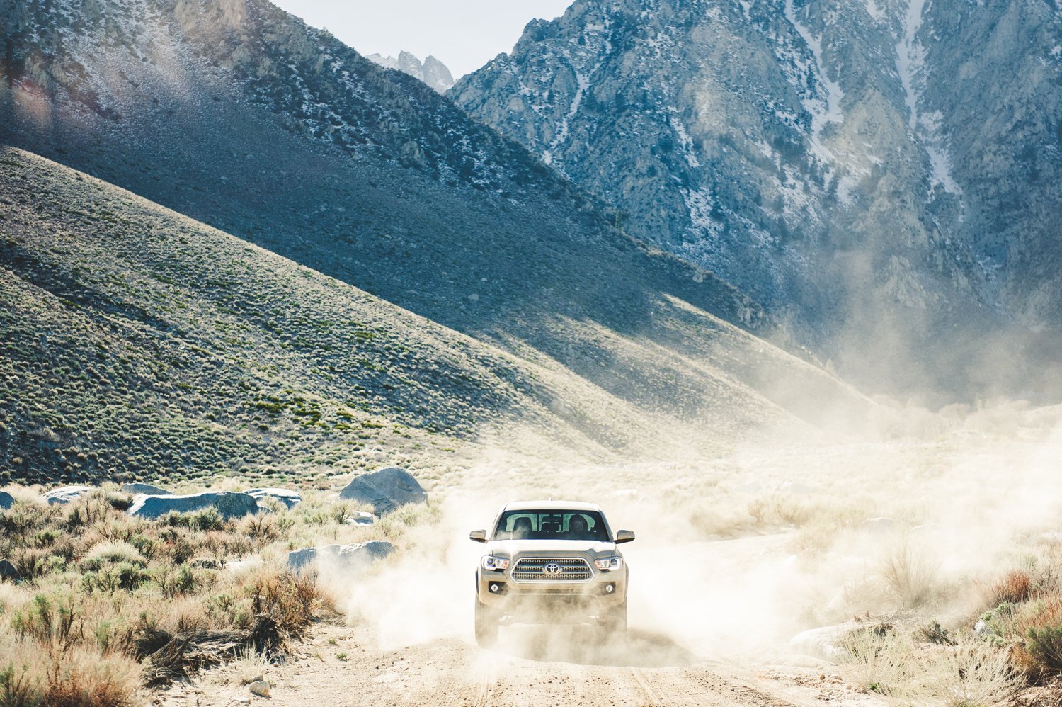 Toyota 4Runner driving on a dirt road, photo by Mark Skovorodko.