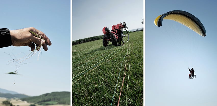 A triptych of photos by Colin Dutton for Progeo featuring scenes of a paraglider that uses a wheelchair. The photo on the left is a picture of a man's hand holding a handful of grass. The center photo features the paraglider in a wheelchair, tilted back and propping themself up with their arms on some grass, having just landed from a flight. On the right is a photo of the paraglider in flight.