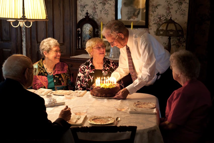 Elderly people celebrating an old woman's birthday photographed by Steve Greer of Philadelphia