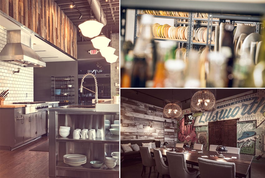 A triptych of photos by Teri Campbell. On the left is a photo of a large professional-looking kitchen. It features a gas stove with a large metal exhaust hood overhead and a metal central kitchen island. There are four identical interesting lighting fixtures hanging from the ceiling over the island. On the top right is a photo of a rack of plates on a large shelving unit. From left to right, the colors of the plates range from yellow and orange to white, and out of focus in the foreground, there appear to be a collection of bottles. On the bottom right is a room with walls finished with wood. There is a conference table in the center of the room with eight gray upholstered chairs around it. To left of the table is a couch. Above the table hang two identical artistic lighting fixtures, and the wall behind the table features a colorful mural.