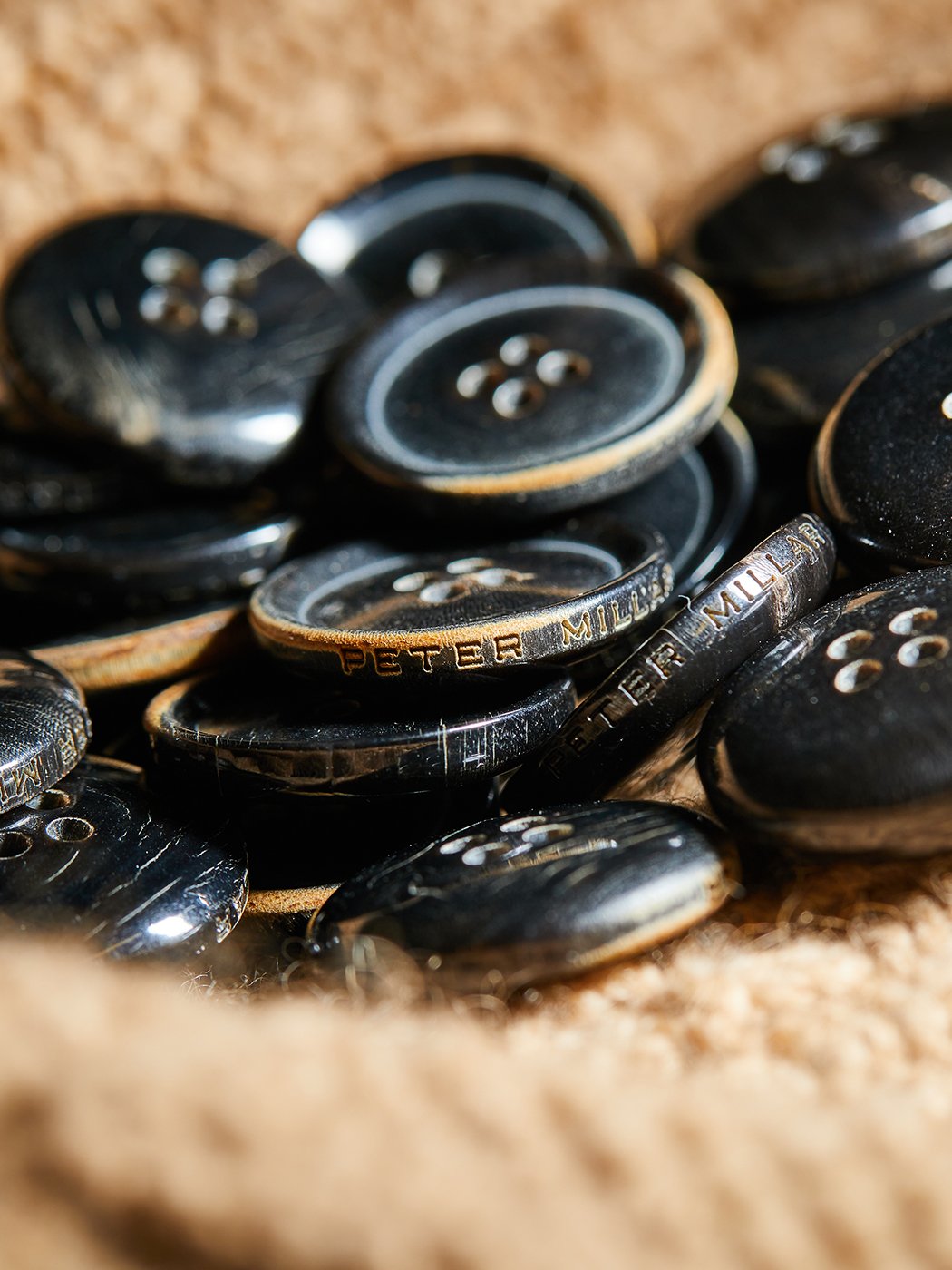 Peter Millar buttons at Albion Knitting co. shot by Jackson Ray Petty 