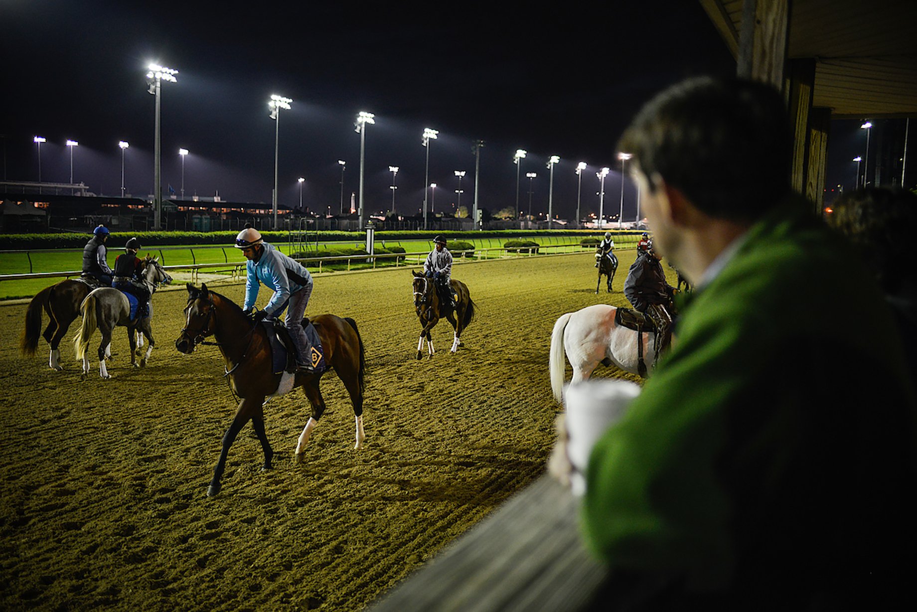Exercise riders take this years derby horses onto the track for practice during the 141st running of the Kentucky Derby at Churchill Downs shot by William DeShazer