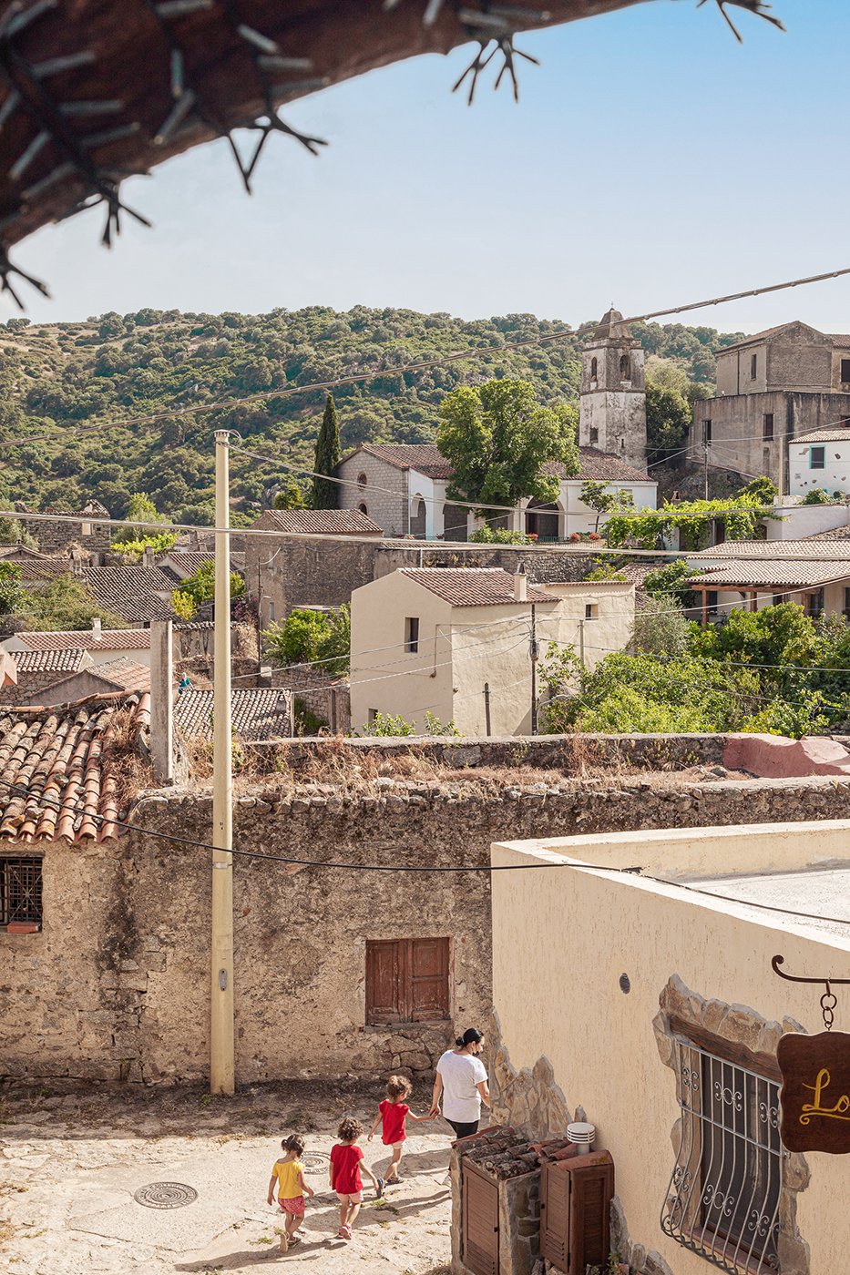 Medieval homes on the hill in Lovelle Sardinia shot by Alberto Bernasconi for Enjoy magazine