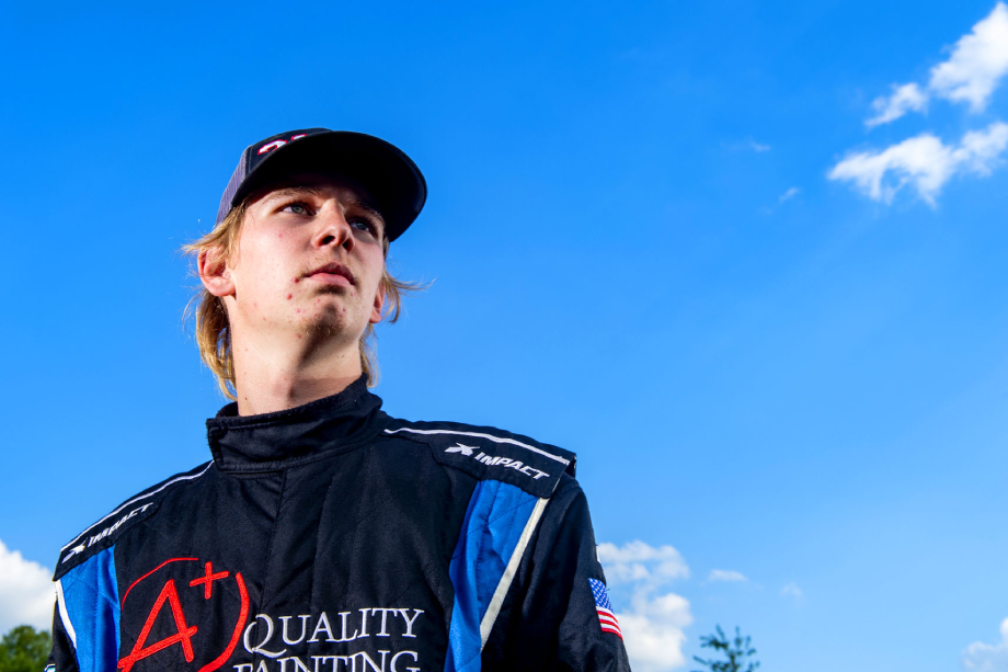 Young driver in front of an open blue sky at Wake County Speedway shot by Bryan Regan for Walter Magazine.