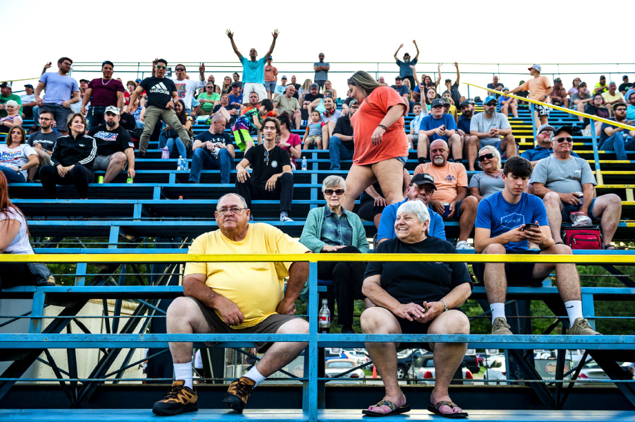 Crowds on the bleachers at Wake County Speedway shot by Bryan Regan for Walter Magazine.