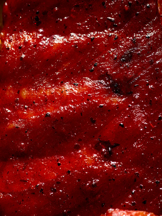 Close up of rib sauce photographed by Dhanraj Emanuel for Keto BBQ. 