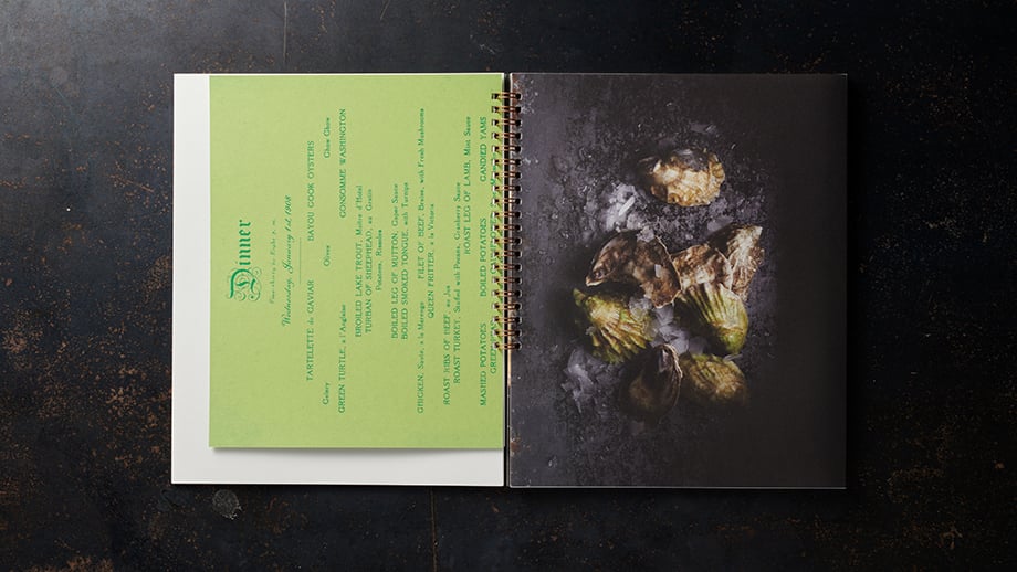 Dick Patricks booklet laid out with a classic New Orleans menu inside