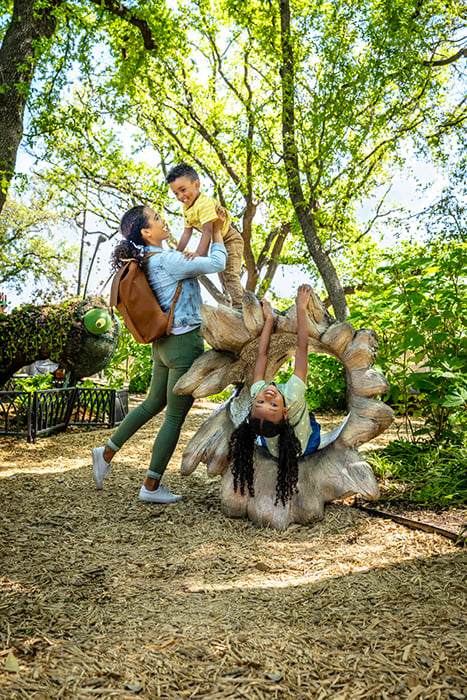 A family visits the Rory Myers Adventure Garden. Photography by Inti St. Clair for Visit Dallas. 