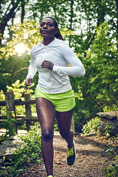 Aaliyah Covington running. Photographed by Max Thomsen for Milwaukee Magazine.