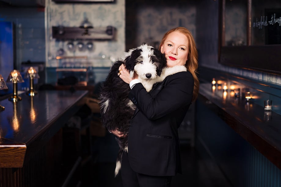 Tiffany Faison with her dog. Photographed by Nicole Loeb for 9Tailors. 
