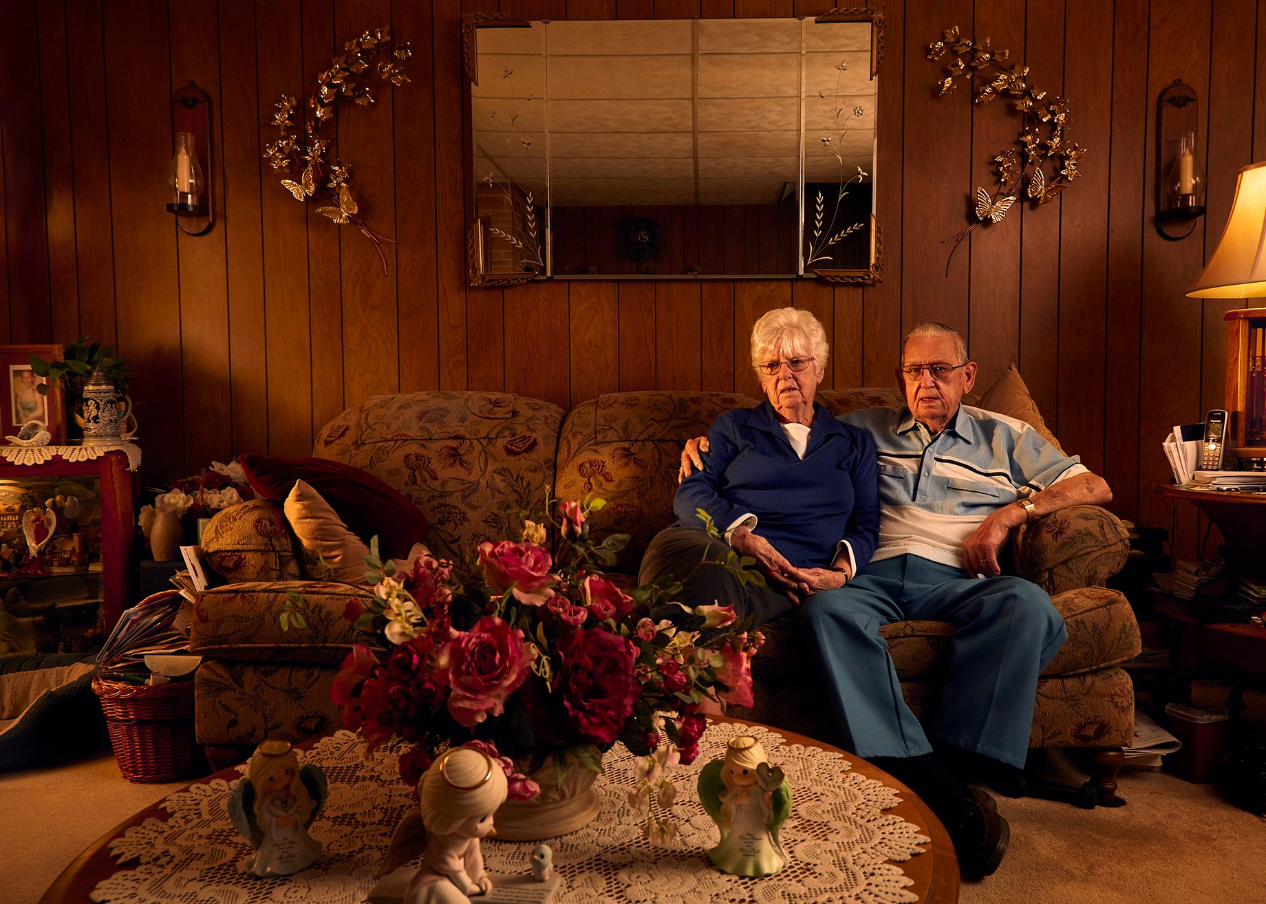 Photographer Sean Scheidt's grandparents sitting on the couch in their family home