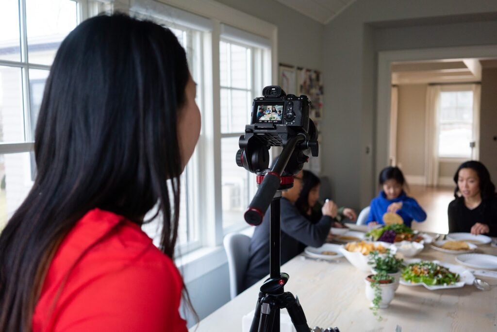 A behind-the-scenes image of lifestyle photographer Nicole Loeb using rental equipment on a project for Tiny Spoon Chef.